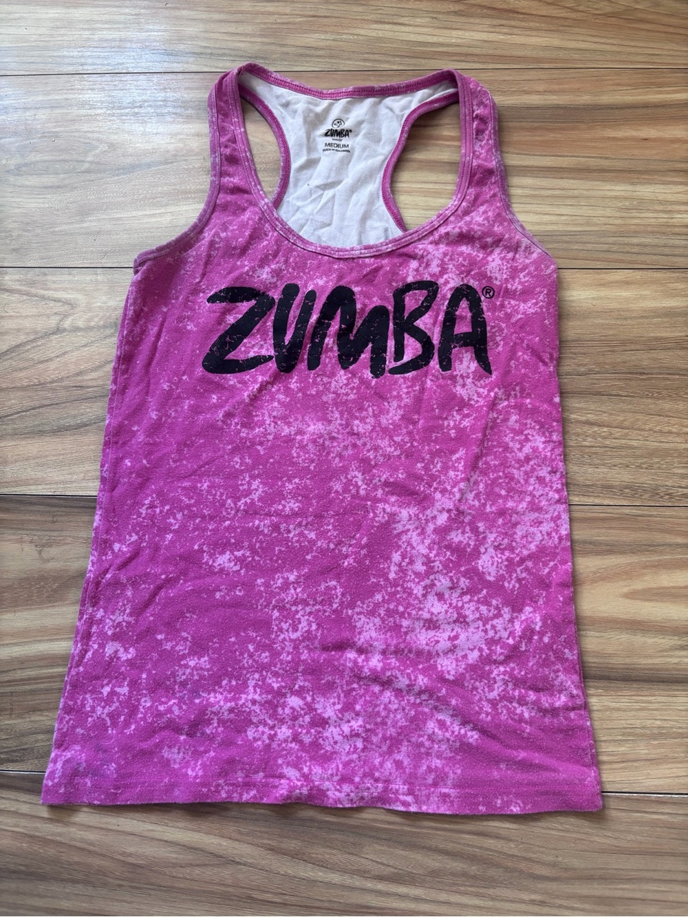 Pink Zumba tank top with white speckled pattern, size M